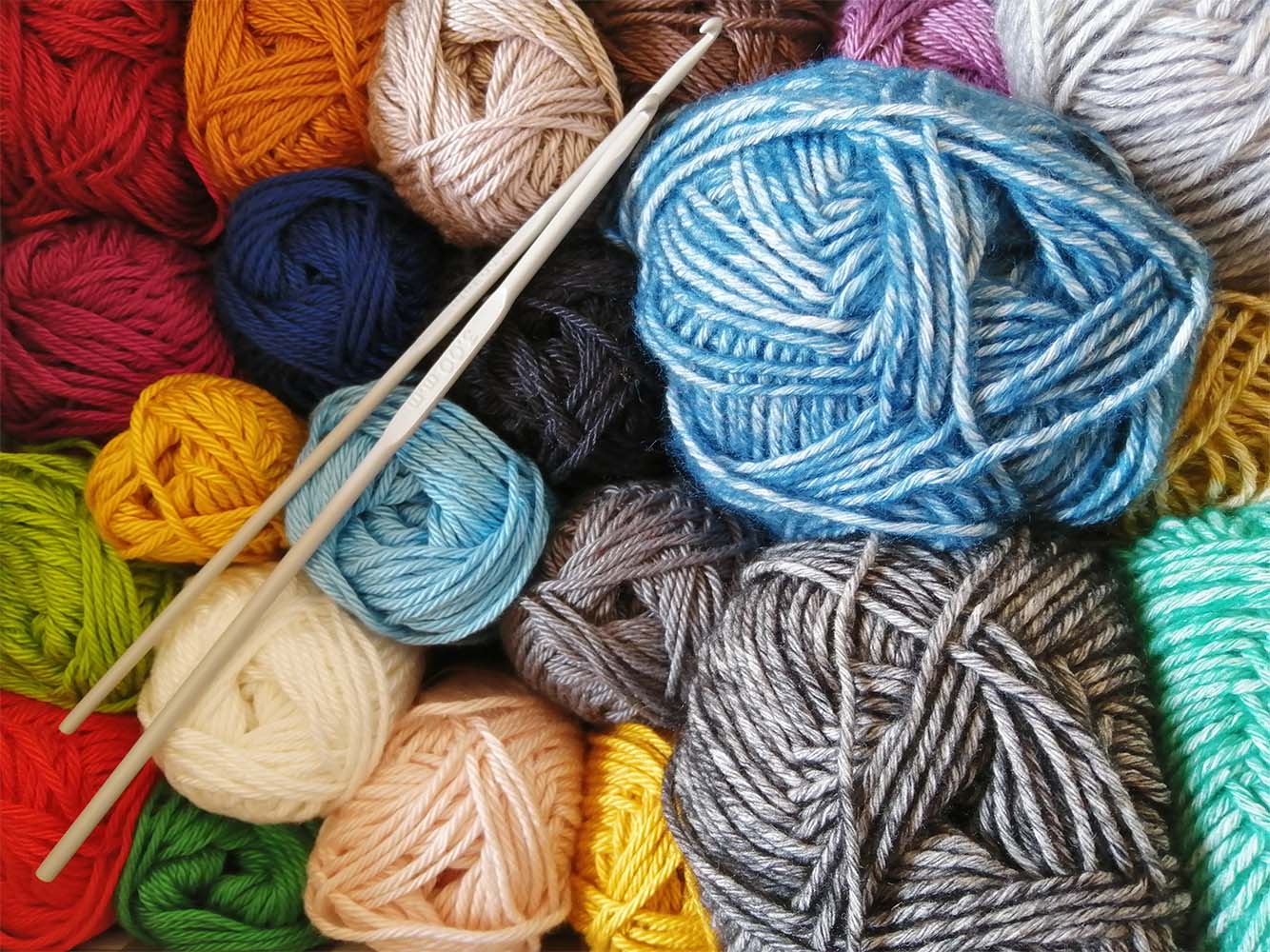 Balls of Wool & Knitting Needles