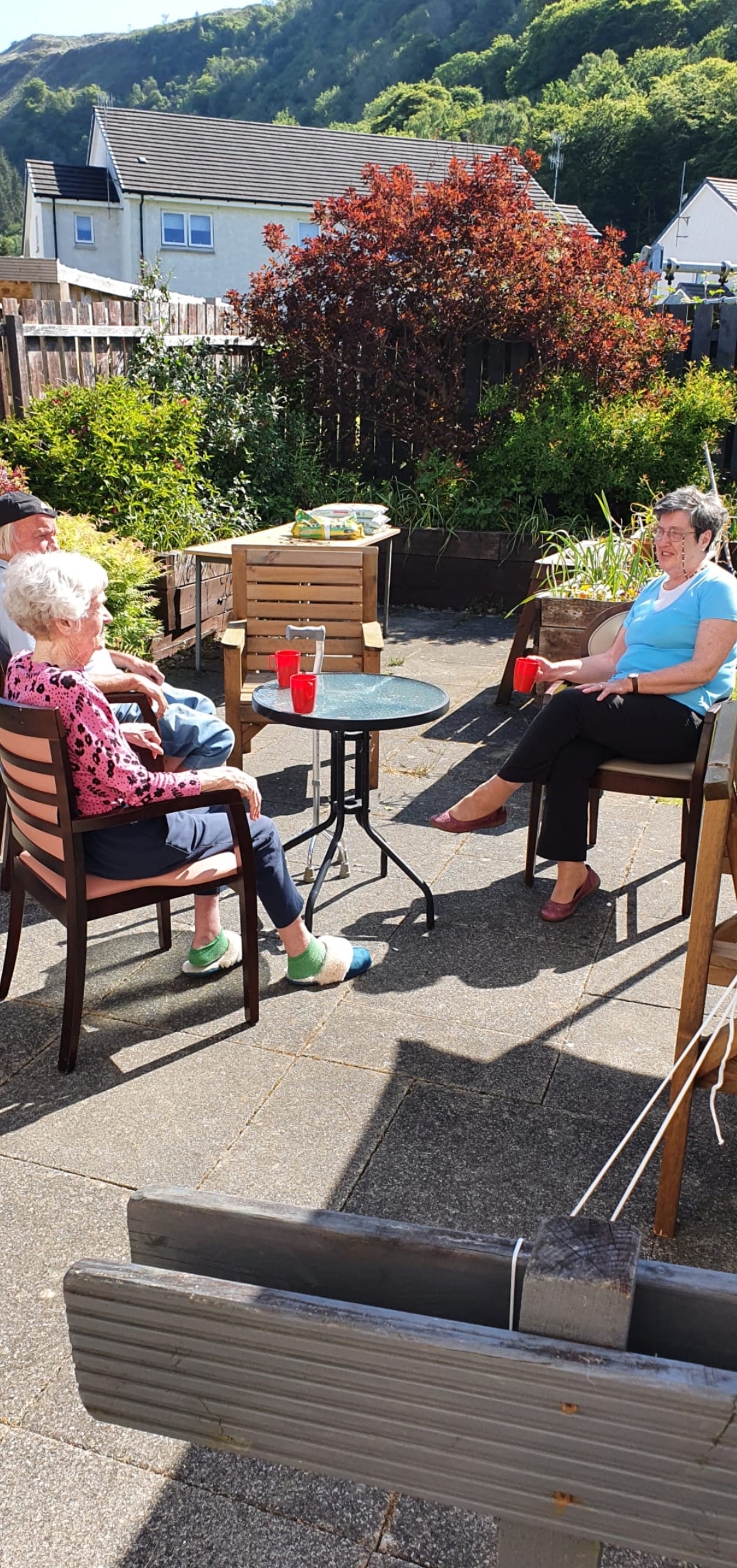 Residents Chatting in The Garden