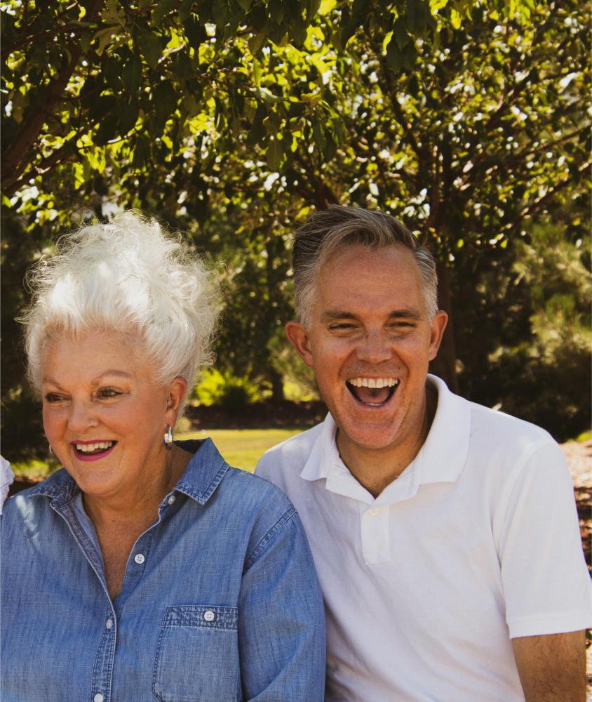 older-couple-laughing-outside