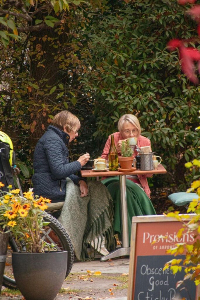 elderly-people-enjoying-a-coffee-outside-at-a-cafe