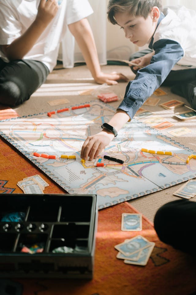 children playing board games